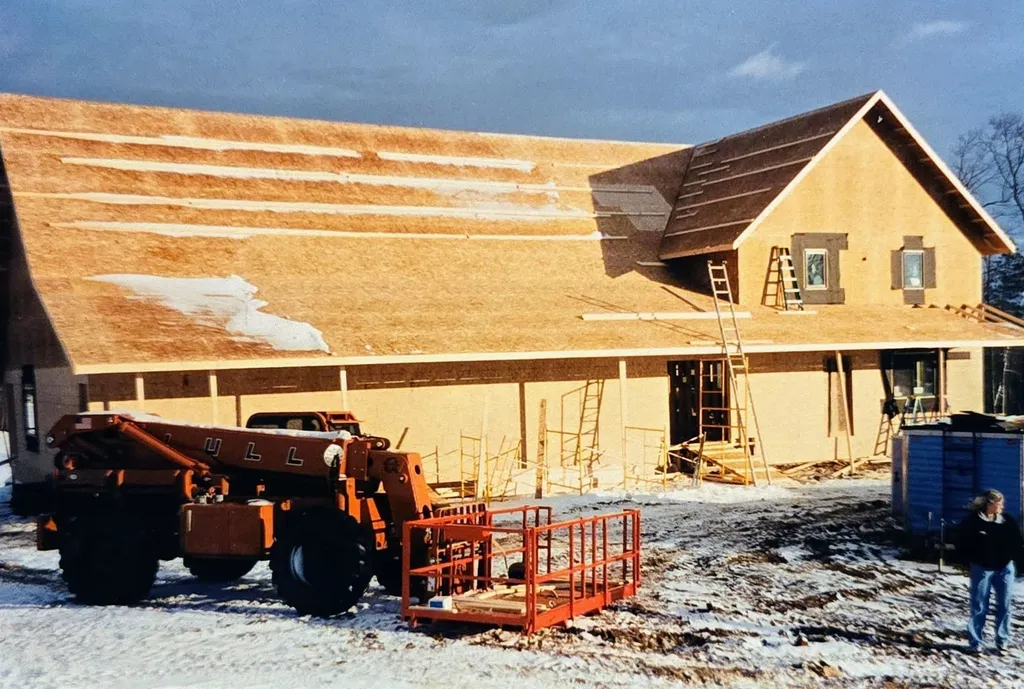 The Golden Eagle clubhouse under construction in winter, framing stage