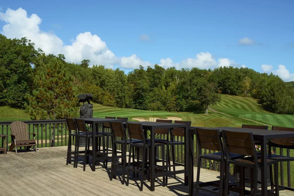 Tables set for a clubhouse event at Golden Eagle