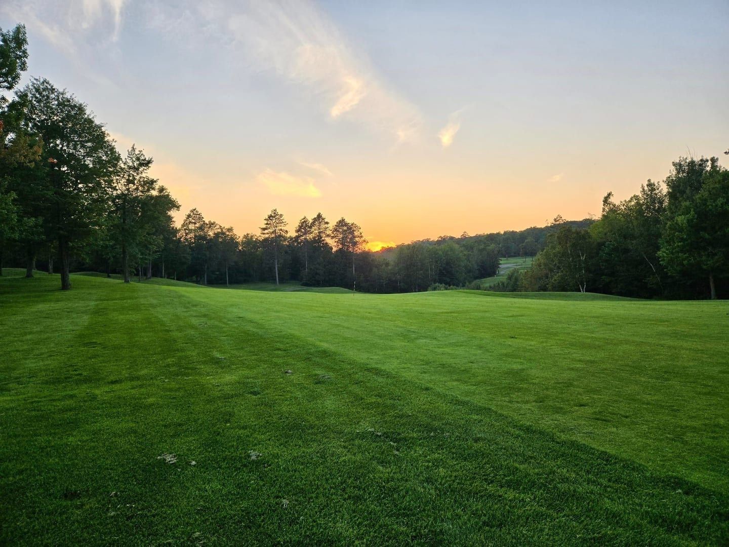Golden Eagle Golf Club fairway winding through the Northwoods