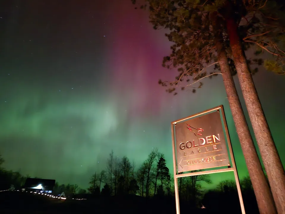 Northern lights dancing above Golden Eagle on a clear Northwoods night