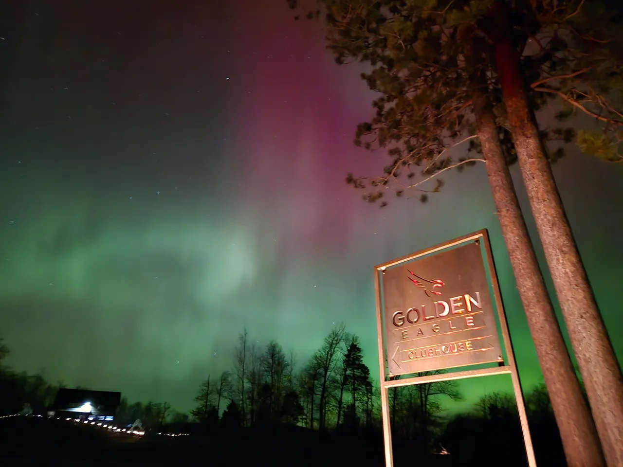 Northern lights dancing above Golden Eagle on a clear Northwoods night